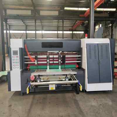 Elektrisch gesteuerte Rotations-Rill- und Schlitzmaschine für Wellpappe, für Mindestformat 400 mm x 600 mm und max. mechanische Geschwindigkeit 150 m/min